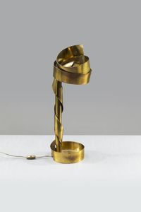 FERDINANDO LOFFREDO - Lampada da tavolo costituita da un nastro di ottone intrecciato. Anni '70 Etichetta del Produttore cm 65x23