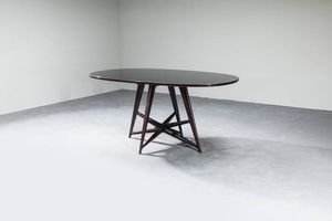 PRODUZIONE ITALIANA - Tavolo in legno di mogano  piano in vetro. Anni '50 cm 79x124x74