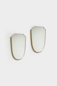 PRODUZIONE ITALIANA - Coppia di specchiere con bordo in ottone. Anni '50 cm 75x48