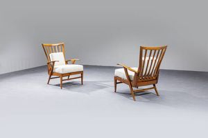 RENZO FRANCHI - Coppia di poltrone con struttura in legno  cuscini imbotti rivestiti in tessuto boucl.  Prod. Camea anni '50  [..]