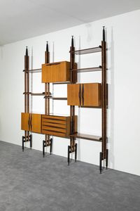 PRODUZIONE ITALIANA - Libreria componibile in legno con maniglie in pelle. Fine anni '50 inizi anni '60 cm 284x41 5x240