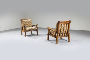 PRODUZIONE ITALIANA - Coppia di poltrone con struttura in legno  cuscini imbottiti rivestiti in tessuto. Anni fine anni '50 inizi anni  [..]