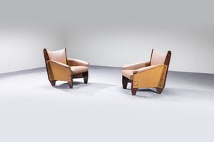 VITTORIO GREGOTTI  attribuito - Coppia di poltrone con struttura in compensato curvato  cuscini imbottiti rivestiti in vinilpelle. Anni '50 cm  [..]