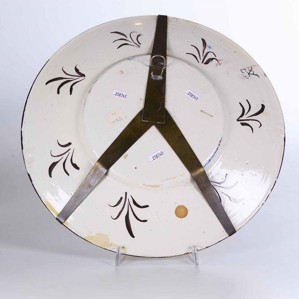 Grande piatto<BR>Pavia, Bottega Rampini, inizi del XVIII secolo<BR>  - Asta Maioliche e Porcellane - Associazione Nazionale - Case d'Asta italiane