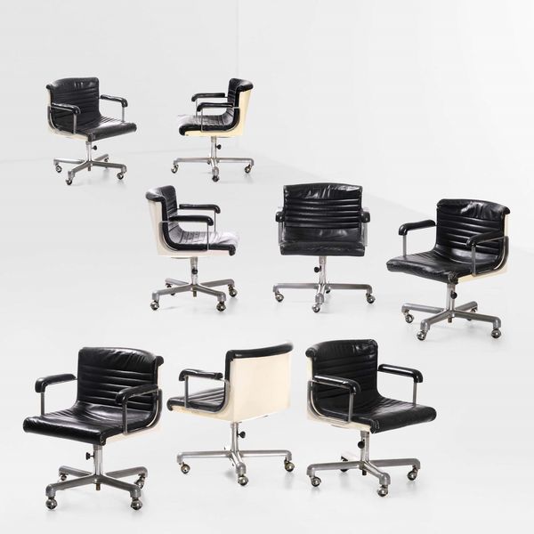 ETTORE SOTTSASS : Otto poltrone su rotelle mod. Sitdown  - Asta Design - Associazione Nazionale - Case d'Asta italiane