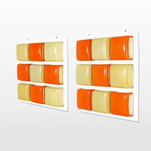 ANGELO MANGIAROTTI - Diciotto lampade mod. Cnosso montate su pannelli