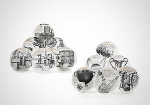 Piero Fornasetti - Dodici piatti in porcellana decorata e smaltata.