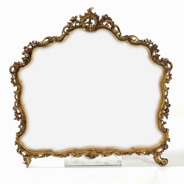 Specchiera in legno sagomato e dorato in stile  - Asta  Antiquariato gennaio | Cambi Time - Associazione Nazionale - Case d'Asta italiane