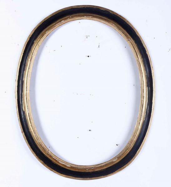 Cornice ovale in legno ebanizzato con profili dorati  - Asta  Antiquariato gennaio | Cambi Time - Associazione Nazionale - Case d'Asta italiane