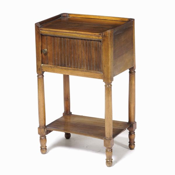 Comodino in legno con anta scorrevole a rullo  - Asta  Antiquariato gennaio | Cambi Time - Associazione Nazionale - Case d'Asta italiane