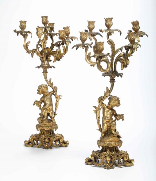 Coppia candelabri con putti in metallo dorato. XIX secolo  - Asta  Antiquariato gennaio | Cambi Time - Associazione Nazionale - Case d'Asta italiane