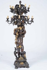 Grande candelabro in bronzo patinato. XX secolo  - Asta  Antiquariato gennaio | Cambi Time - Associazione Nazionale - Case d'Asta italiane
