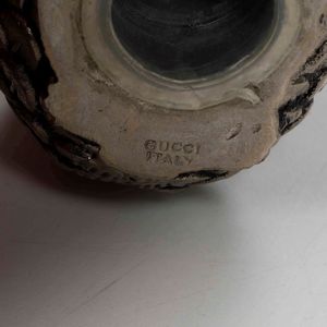 Saliera e pepiera in metallo a firma Gucci. Italia XX secolo  - Asta  Antiquariato gennaio | Cambi Time - Associazione Nazionale - Case d'Asta italiane