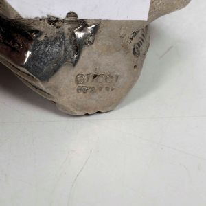 Saliera e pepiera in metallo a firma Gucci. Italia XX secolo  - Asta  Antiquariato gennaio | Cambi Time - Associazione Nazionale - Case d'Asta italiane