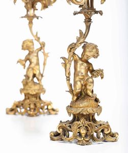 Coppia candelabri con putti in metallo dorato. XIX secolo  - Asta  Antiquariato gennaio | Cambi Time - Associazione Nazionale - Case d'Asta italiane