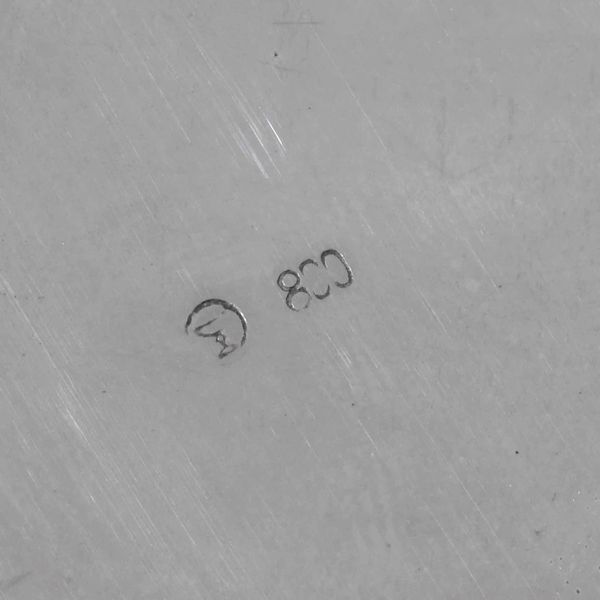 Cestino. Argento fuso e sagomato, manico ad arco in legno ebanizzato. Argenteria artistica italiana del XX secolo  - Asta Argenti | Cambi TIME - Associazione Nazionale - Case d'Asta italiane