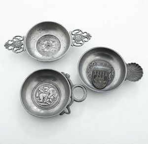 Lotto di una salsiera, tre ciotole, un tastevin in peltro e metallo argentato e un cestino in peltro e porcellana dipinta  - Asta Argenti | Cambi TIME - Associazione Nazionale - Case d'Asta italiane