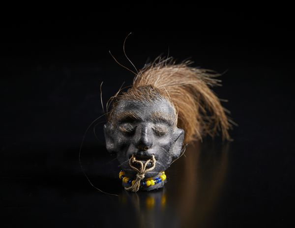 Arte africana : Costa d'Avorio/ Liberia, Guer�/W�.Scultura/maschera in legno e caolino. Segni d'uso.  - Asta Asta 392 | ARTE ORIENTALE E ISLAMICA - ARTE AFRICANA, OCEANICA E DELLE AMERICHE - EAST AND SOUTH: ASIAN, ISLAMIC, INDIAN AND ETHNOGRAPIC ART Online - Associazione Nazionale - Case d'Asta italiane