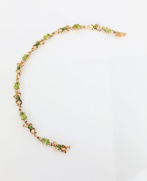 Bracciale tartarughine in oro, peridoti e brillanti  - Asta Asta a Tempo - Gioielli e Preziosi - Associazione Nazionale - Case d'Asta italiane