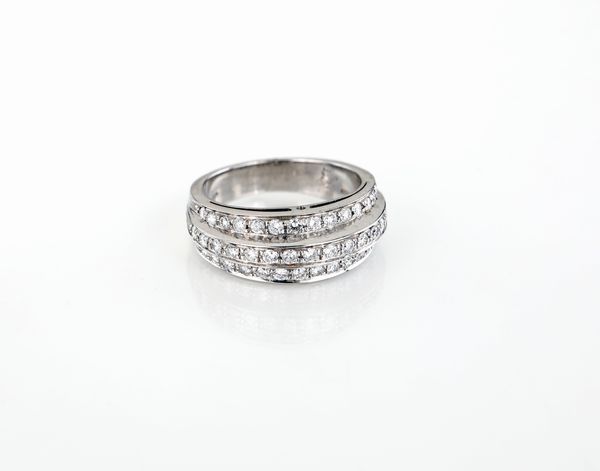 Anello a fascia in oro e brillanti  - Asta Asta a Tempo - Gioielli e Preziosi - Associazione Nazionale - Case d'Asta italiane