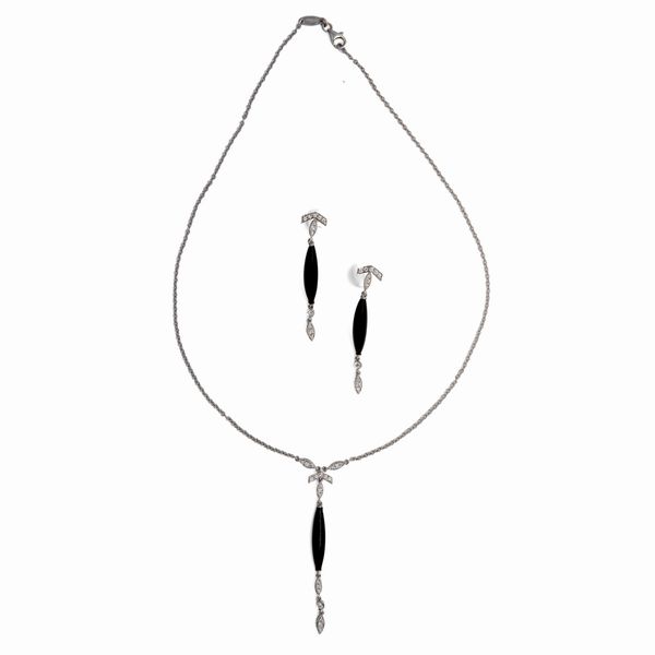 Parure in oro collana e orecchini, brillanti e onice  - Asta Asta a Tempo - Gioielli e Preziosi - Associazione Nazionale - Case d'Asta italiane