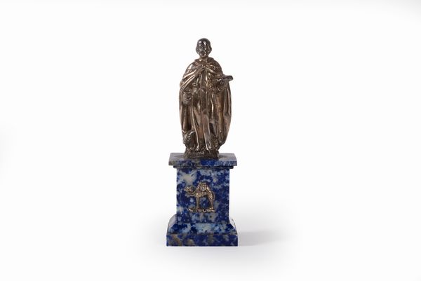 Statuetta raffigurante Sant'Antonio Abate in argento su base in lapislazzuli, prima met secolo XX  - Asta Incanti d'arte - Associazione Nazionale - Case d'Asta italiane