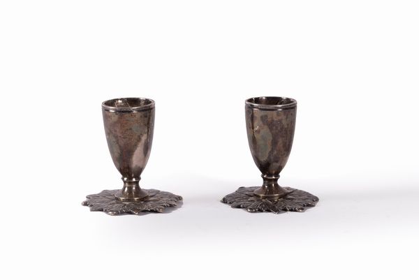 Coppia di porta candele in argento, secolo XIX  - Asta Incanti d'arte - Associazione Nazionale - Case d'Asta italiane