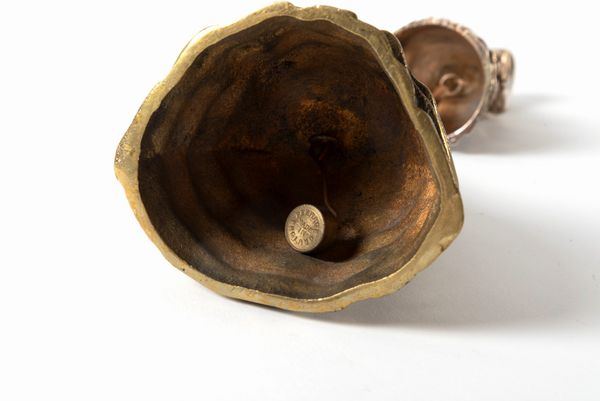 Lotto composto da diciannove campanelli in bronzo dorato, argentato e policromo, secolo XX  - Asta Incanti d'arte - Associazione Nazionale - Case d'Asta italiane