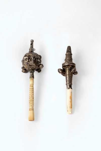 Due sonagli in argento e osso, secolo XIX  - Asta Incanti d'arte - Associazione Nazionale - Case d'Asta italiane