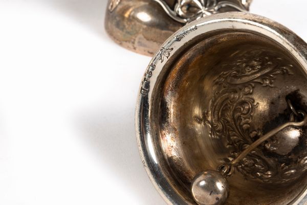 Lotto composto da sei campanelli in argento Sterling, secolo XX  - Asta Incanti d'arte - Associazione Nazionale - Case d'Asta italiane