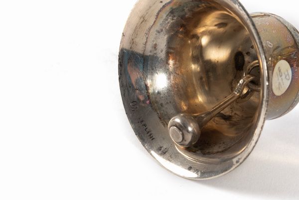 Lotto composto da sedici campanelli in argento Sterling, secoli XIX - XX  - Asta Incanti d'arte - Associazione Nazionale - Case d'Asta italiane