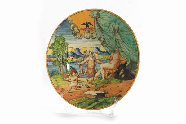 Piatto istoriato in maiolica policroma raffigurante Venere, Satiro e Cupido  - Asta Incanti d'arte - Associazione Nazionale - Case d'Asta italiane