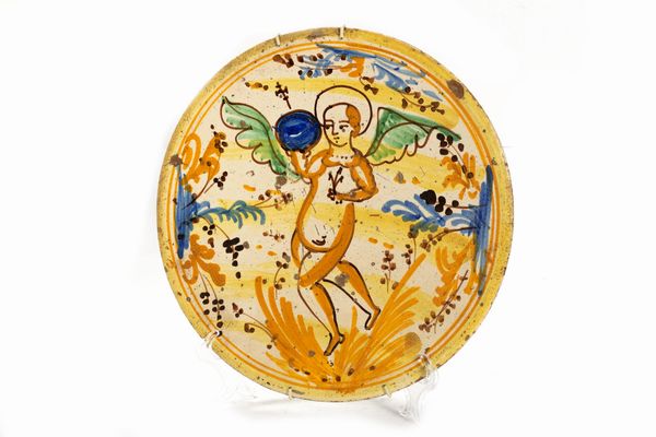 Antico piatto in maiolica policroma con angelo al centro  - Asta Incanti d'arte - Associazione Nazionale - Case d'Asta italiane