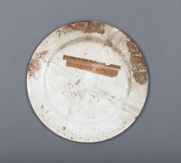 CASTELLI D'ABRUZZO, XIX SECOLO : Piccolo piatto con raffigurazione di Venere sdraiata nel cavetto, entro bordatura a decori a palmette e fitomorfi  - Asta Asta 395 | ARTE ANTICA E DEL XIX SECOLO Online - Associazione Nazionale - Case d'Asta italiane