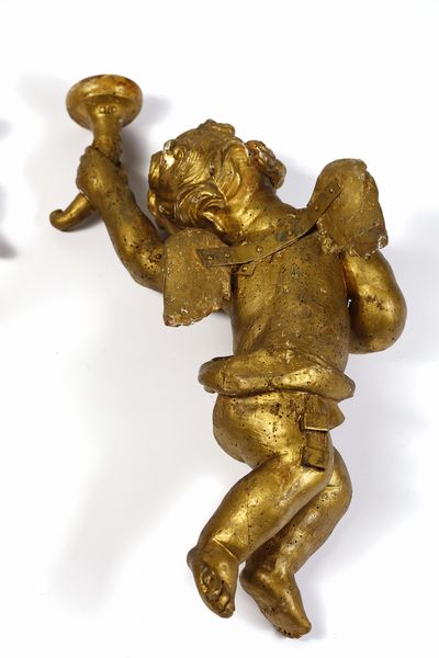 SCULTORE CENTROITALIANO DEL XVII-XVIII SECOLO : Coppia di putti alati in legno scolpito e dorato raffigurati nell'atto di reggere delle cornucopie  - Asta Asta 395 | ARTE ANTICA E DEL XIX SECOLO Online - Associazione Nazionale - Case d'Asta italiane