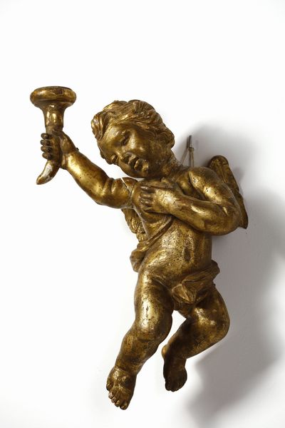 SCULTORE CENTROITALIANO DEL XVII-XVIII SECOLO : Coppia di putti alati in legno scolpito e dorato raffigurati nell'atto di reggere delle cornucopie  - Asta Asta 395 | ARTE ANTICA E DEL XIX SECOLO Online - Associazione Nazionale - Case d'Asta italiane