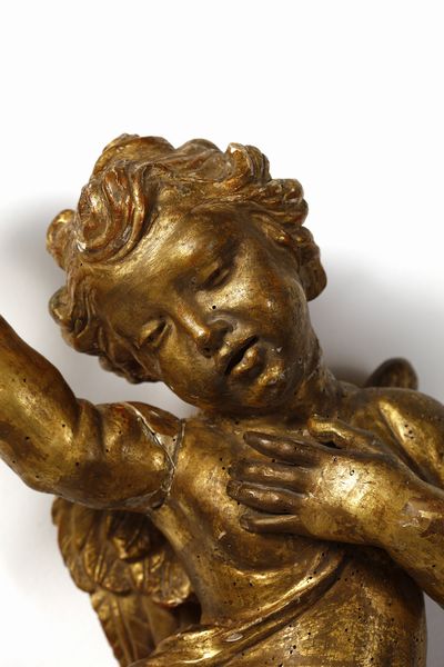 SCULTORE CENTROITALIANO DEL XVII-XVIII SECOLO : Coppia di putti alati in legno scolpito e dorato raffigurati nell'atto di reggere delle cornucopie  - Asta Asta 395 | ARTE ANTICA E DEL XIX SECOLO Online - Associazione Nazionale - Case d'Asta italiane