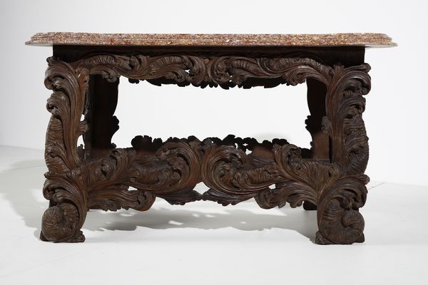 MANIFATTURA ITALIANA DEL XVII-XVIII SECOLO : Tavolo in legno intagliato in forma di volute e motivi fitomorfi, piano in marmo broccatello di Spagna  - Asta Asta 395 | ARTE ANTICA E DEL XIX SECOLO Online - Associazione Nazionale - Case d'Asta italiane