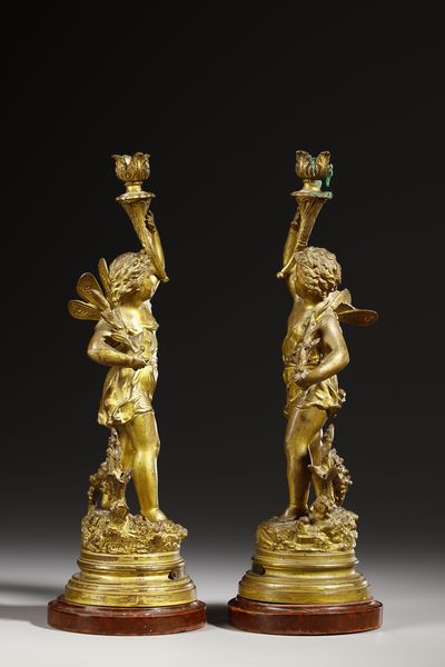 RANCOULET ERNEST (1842 - 1918) : Da un modello di. Coppia di candelabri in bronzo dorato in forma di amorini alati reggifiaccola (allegorie di Autunno e Primavera)  - Asta Asta 395 | ARTE ANTICA E DEL XIX SECOLO Online - Associazione Nazionale - Case d'Asta italiane