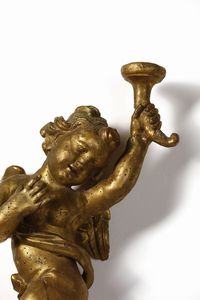 SCULTORE CENTROITALIANO DEL XVII-XVIII SECOLO : Coppia di putti alati in legno scolpito e dorato raffigurati nell'atto di reggere delle cornucopie  - Asta Asta 395 | ARTE ANTICA E DEL XIX SECOLO Online - Associazione Nazionale - Case d'Asta italiane