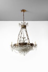 MANIFATTURA DEL XIX SECOLO - Grande lampadario in stile Impero in metallo e cristallo