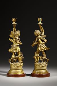 RANCOULET ERNEST (1842 - 1918) : Da un modello di. Coppia di candelabri in bronzo dorato in forma di amorini alati reggifiaccola (allegorie di Autunno e Primavera)  - Asta Asta 395 | ARTE ANTICA E DEL XIX SECOLO Online - Associazione Nazionale - Case d'Asta italiane