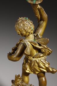 RANCOULET ERNEST (1842 - 1918) : Da un modello di. Coppia di candelabri in bronzo dorato in forma di amorini alati reggifiaccola (allegorie di Autunno e Primavera)  - Asta Asta 395 | ARTE ANTICA E DEL XIX SECOLO Online - Associazione Nazionale - Case d'Asta italiane