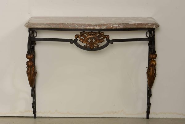 Coppia di consoles in ferro e metallo dorato, piano in marmo. Francia, Napoleone III  - Asta Antiquariato febbraio - Associazione Nazionale - Case d'Asta italiane