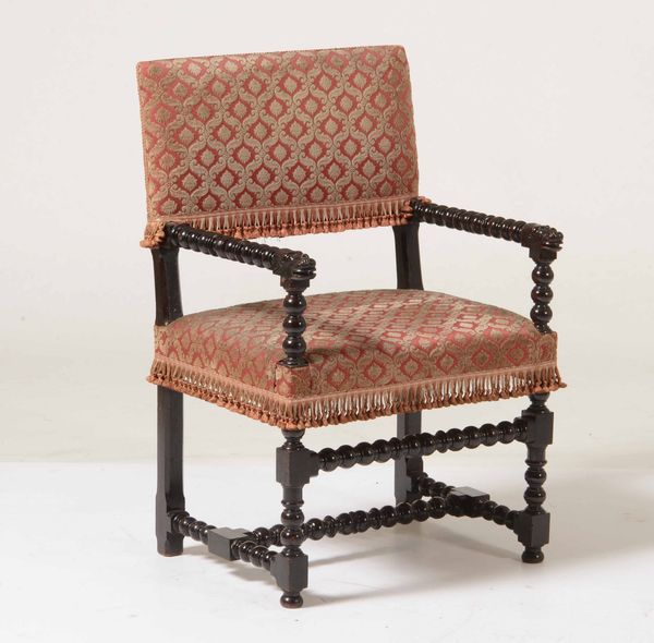 Poltrona a rocchetto in legno scurito e tornito. XVIII-XIX secolo  - Asta Antiquariato febbraio - Associazione Nazionale - Case d'Asta italiane