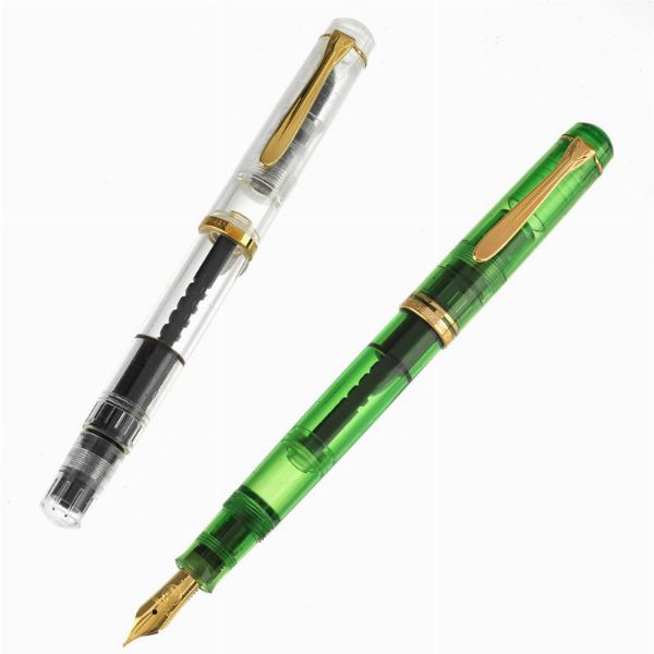 COPPIA DI PELIKAN TRANSPARENT SOUVERAN PENNE STILOGRAFICHE  - Asta Orologi e penne - Associazione Nazionale - Case d'Asta italiane