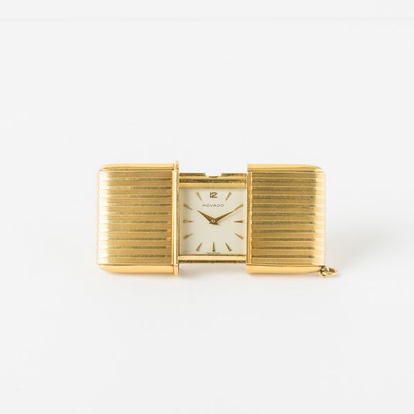 Movado ermeto, orologio da viaggio, 1950 circa, carica manuale, in oro 18 kt, gr 64, 45x25 mm  - Asta Pocket Watches - Associazione Nazionale - Case d'Asta italiane