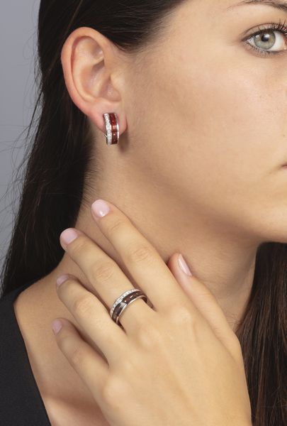 Victor Mayer. Demi-parure composta da anello ed orecchini con smalto e diamanti  - Asta Gioielli - Associazione Nazionale - Case d'Asta italiane