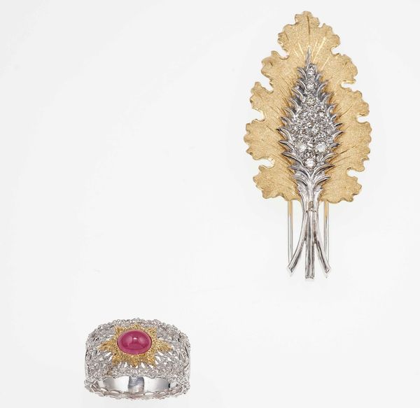 Lotto composto da una clip con diamanti ed un anello con rubino  - Asta Gioielli - Associazione Nazionale - Case d'Asta italiane