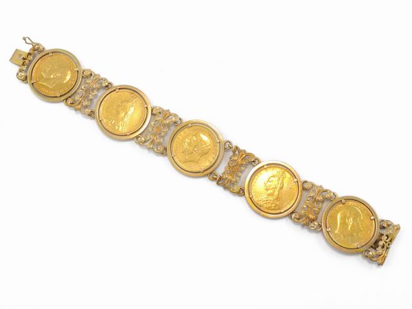 Bracciale in oro giallo con cinque monete da una sterlina  - Asta Gioielli e orologi - Associazione Nazionale - Case d'Asta italiane